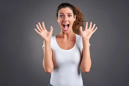 Portrait of a beautiful young woman feeling scared.