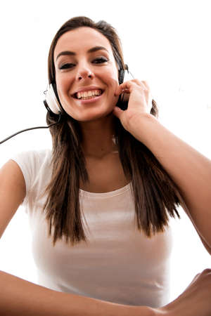 Portrait of a young beautiful woman listening to music