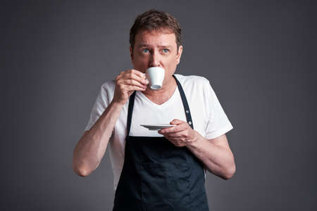 Man with a cup of coffeeの写真素材