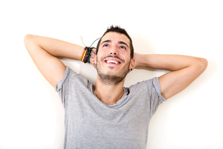 Portrait of a young man in grey shirt.の写真素材