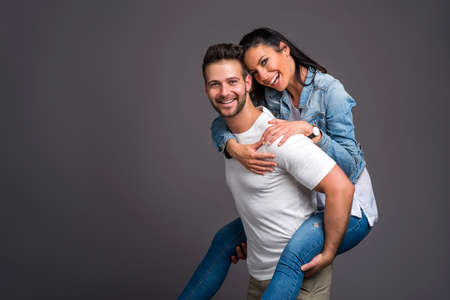 Nice young couple in the studioの写真素材