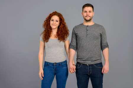 Nice young couple in the studio