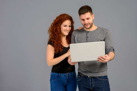 Nice young couple in the studioの写真素材