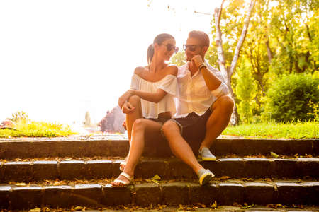Nice young couple on the stairsの写真素材