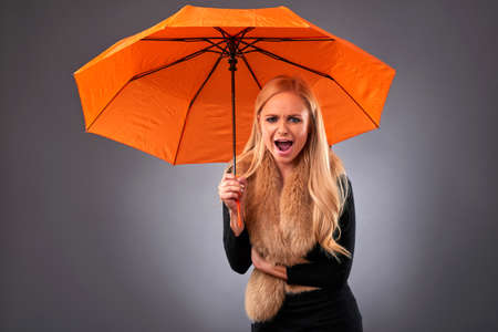 Young woman with an umbrella