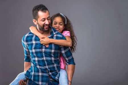 Young black dad with his daughterの写真素材