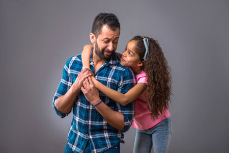Young black dad with his daughterの写真素材