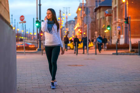 Young woman on the streetの写真素材