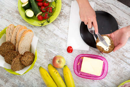 A womans hand with food