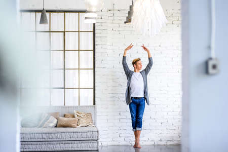 A handsome young male Ballet dancer practicing in a Loft style Aの写真素材