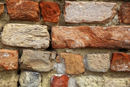 A vintage brick wall of a historic building.の写真素材