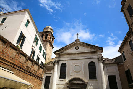 A small church with historic architectures in Venice, Italy, Europe.の写真素材
