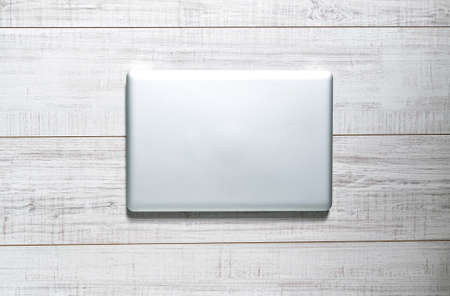 Tabletop with a laptopの写真素材