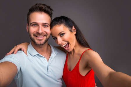 Nice young couple in the studio