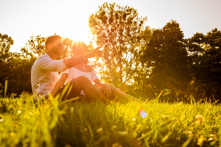 Nice young couple in the parkの写真素材