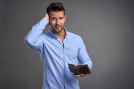 Poor young manの写真素材