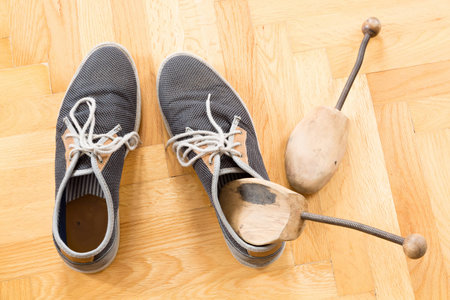 A pair of used sneakersの写真素材