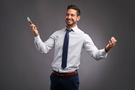 Young man with a smartphoneの写真素材