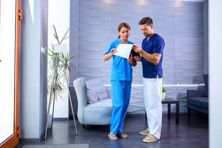 Two Doctors discussing a medical procedure in the clinic.