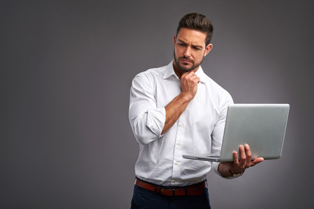 Young man with laptopの写真素材