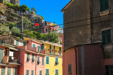 View on the beautiful colourful houses in Cinque Terre, Italy on a sunny day.の写真素材