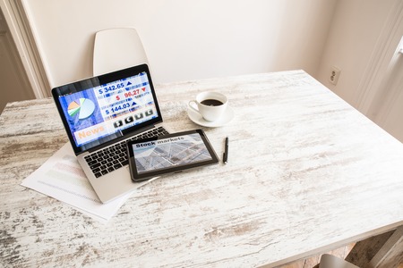 Stock market trading app on a Tablet PC and Laptop PCの写真素材