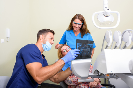 A patient getting attended and treatment in a dental studioの写真素材