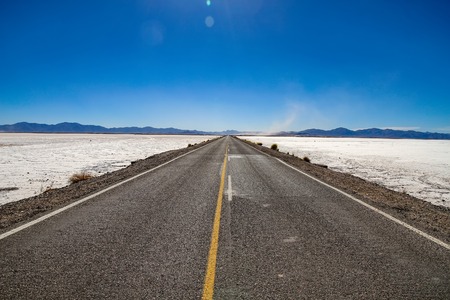 View on the road and the landscape of Salt Lake, Argentina on a sunny dayの写真素材