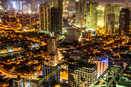 Skyline of Manila by the River Pasigのeditorial素材