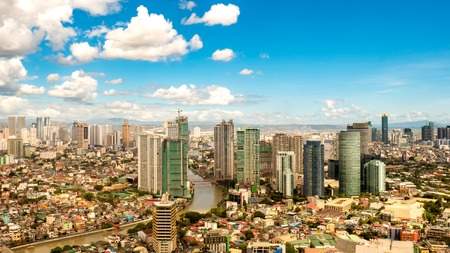 Skyline of Manila by the River Pasigのeditorial素材