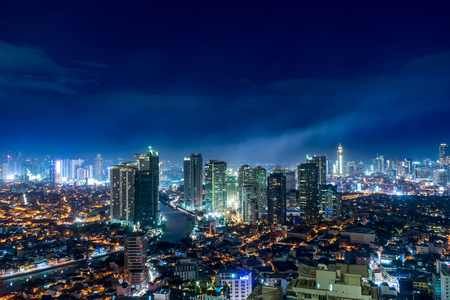 Panorama view over the skyline of Makati, Manila at nightのeditorial素材