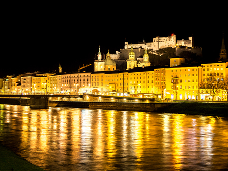 Panorama of the riverside of Salzburg in Austria at nightのeditorial素材