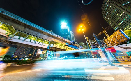 BANGKOK, THAILAND - CIRCA MARCH 2018: View on illuminated streets of the city as traffic passes by...