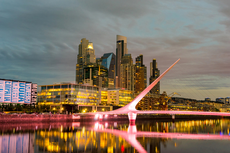 BUENOS AIRES, ARGENTINA - CIRCA FEBRUARY 2019: View on skyscrapers and the famous Bridge of the Woman in the neighborhood of Puerto Madero circa February 2019 in Buenos Aires, Argentina.のeditorial素材