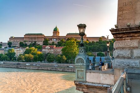 BUDAPEST, HUNGARY - CIRCA JUNE 2019: View on the famous Castle of Budapest as the sun sets circa June 2019 in Budapest, Hungary.のeditorial素材