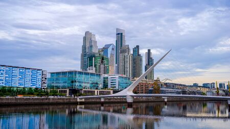 BUENOS AIRES, ARGENTINA - CIRCA FEBRUARY 2019: View on skyscrapers and the famous Bridge of the Woman in the neighborhood of Puerto Madero circa February 2019 in Buenos Aires, Argentina.のeditorial素材