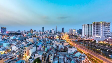 HO CHI MINH CITY, VIETNAM - CIRCA MARCH 2018: View on the skyline of the city at the riverside during sunset circa March 2018 in Ho Chi Minh City, Vietnam.のeditorial素材