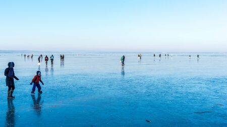 BALATONBOGLAR, HUNGARY - JANUARY 22: View on the frozen Lake Balaton in Hungary as people enjoy the weather on January 22, 2017 in Budapest, Hungary.のeditorial素材