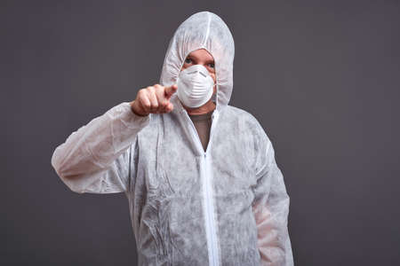 Man in a clothes protector suit