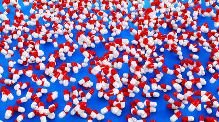 3D Illustration of a capsules containing drugs, pharmaceuticals or medication.の写真素材
