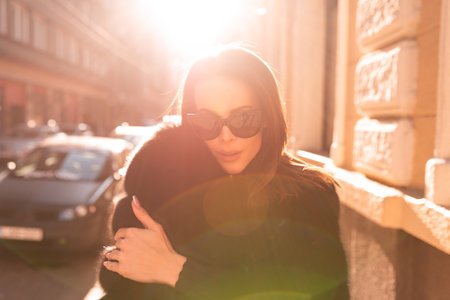Fashion portrait of a young female model on the streetの写真素材