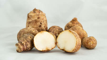 jerusalem artichokes on white backgroundの写真素材