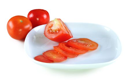 A square plate of sliced tomatoの写真素材