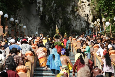 BATU CAVES, MALAYSIA - JANUARY 20: The crowd on the stairs leading up to a temple during the Hindu festival of Thaipusam on January 20, 2011 in Batu Caves, Malaysia.のeditorial素材