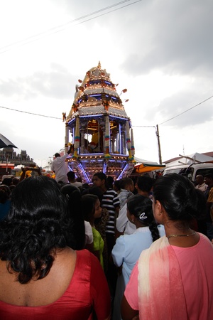 BATU CAVES, MALAYSIA - JANUARY 21: Devotees bid farewell to the chariot carrying a statue of Murugan during the Hindu festival of Thaipusam on January 21, 2011 in Batu Caves, Malaysia.のeditorial素材