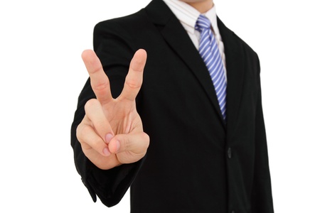 A businessman showing the victory signの写真素材