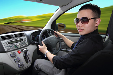 A young man drivingの写真素材