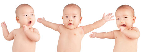 An Asian baby in multiple posesの写真素材