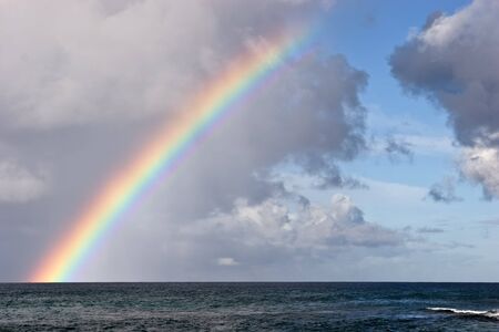 Rainbow on the Hawaiian Island of Kauai new Poipuの写真素材