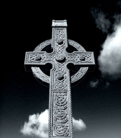 Celtic Cross seem here in black and white surrounded by cloudsの写真素材